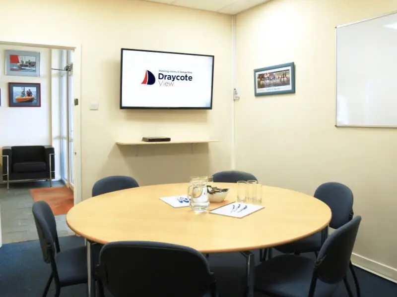 Meeting room with round table and chairs